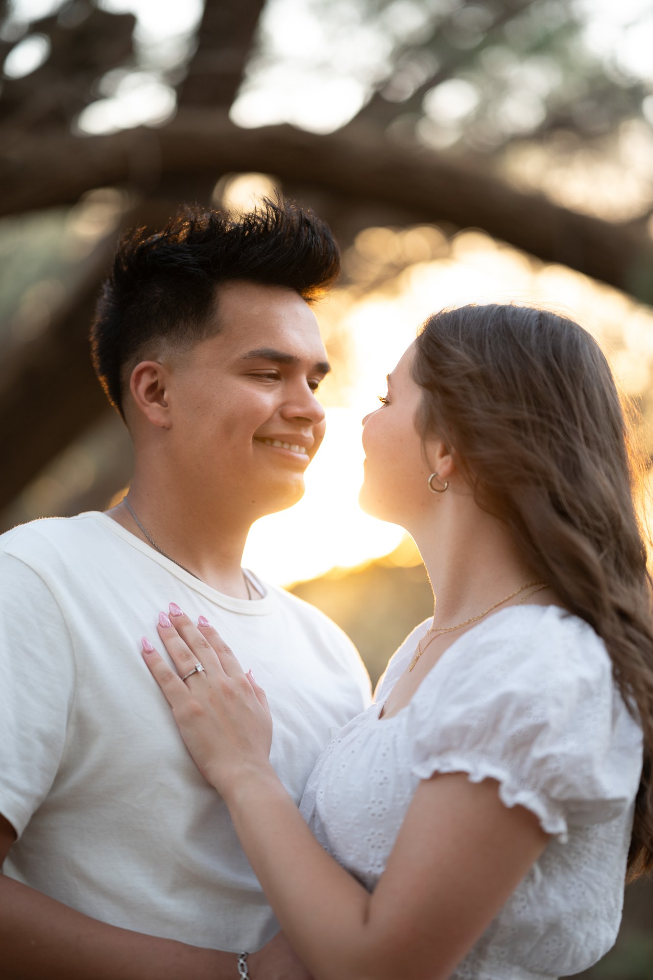 Couple embracing in golden Arizona desert light