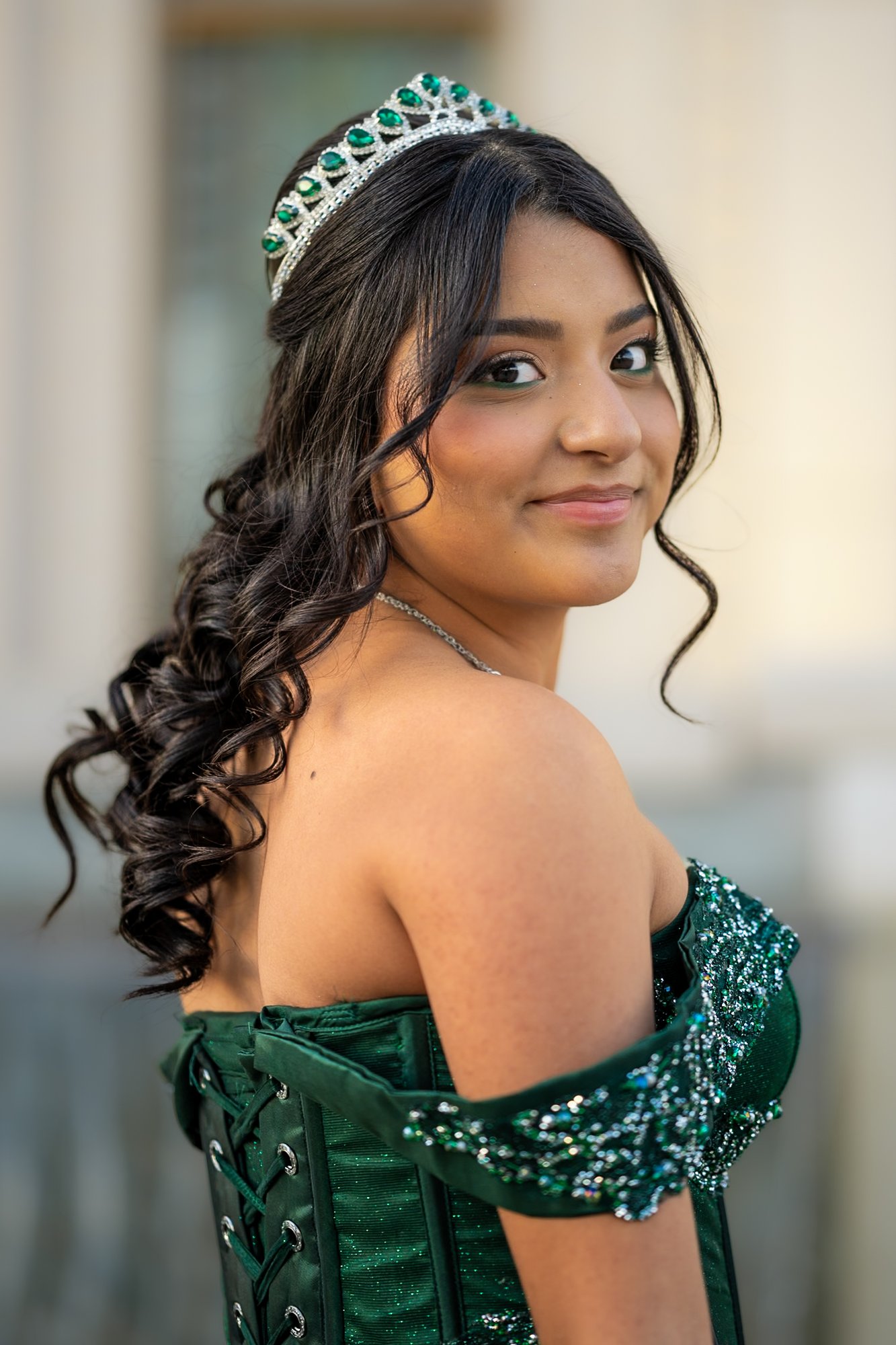 Quinceañera emerald tiara close-up portrait